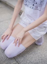 Rabbit plays with painted white stockings over the knee(29)